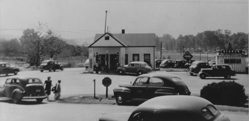  Original Wimpy's stand to right of filling station in front of Arena Park 